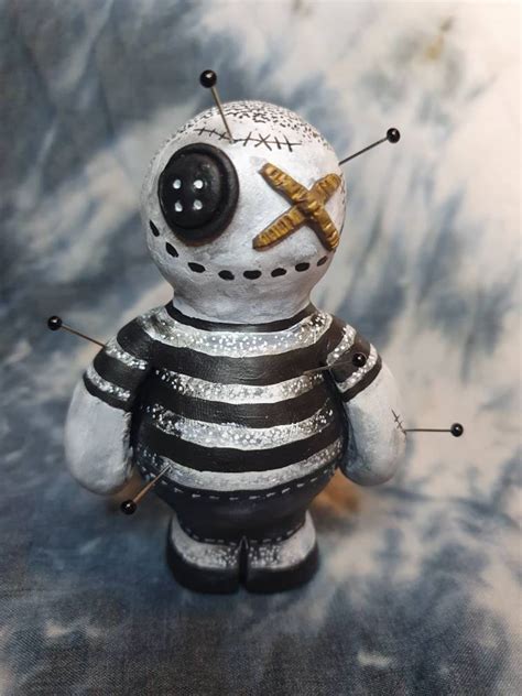 Pugsley Addams and the Forbidden Rituals of His Voodoo Doll